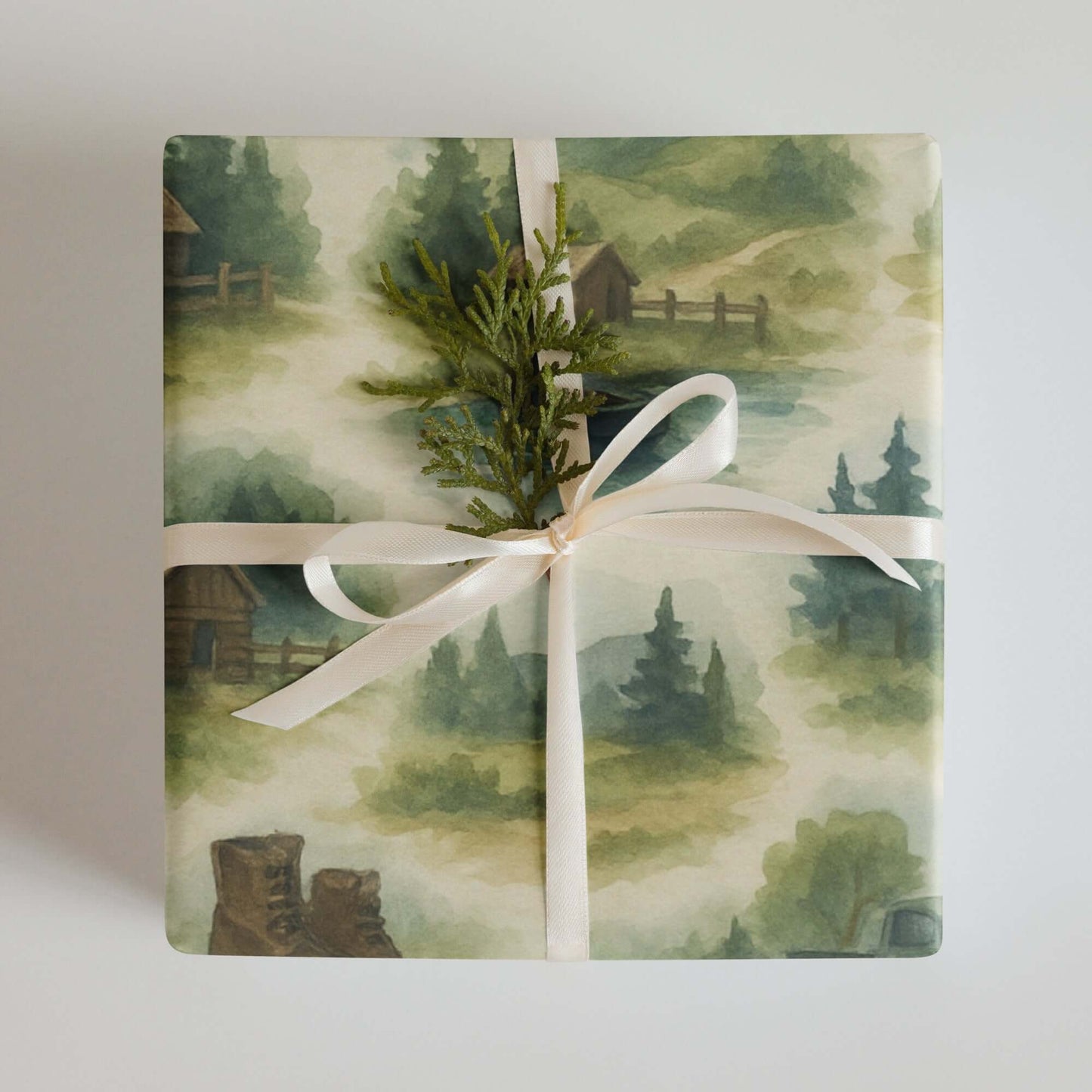 Luxury outdoor-themed wrapping paper featuring watercolor wilderness designs, eco-friendly and made in USA.