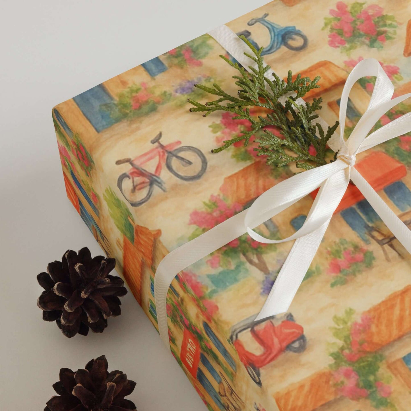 Charming European town-themed luxury wrapping paper with bicycles and floral designs, perfect for holiday gift wrap.