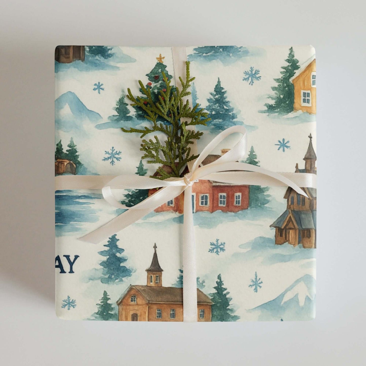 Luxury Christmas wrapping paper featuring cozy villages, evergreen trees, and watercolor snowflakes in a winter scene.