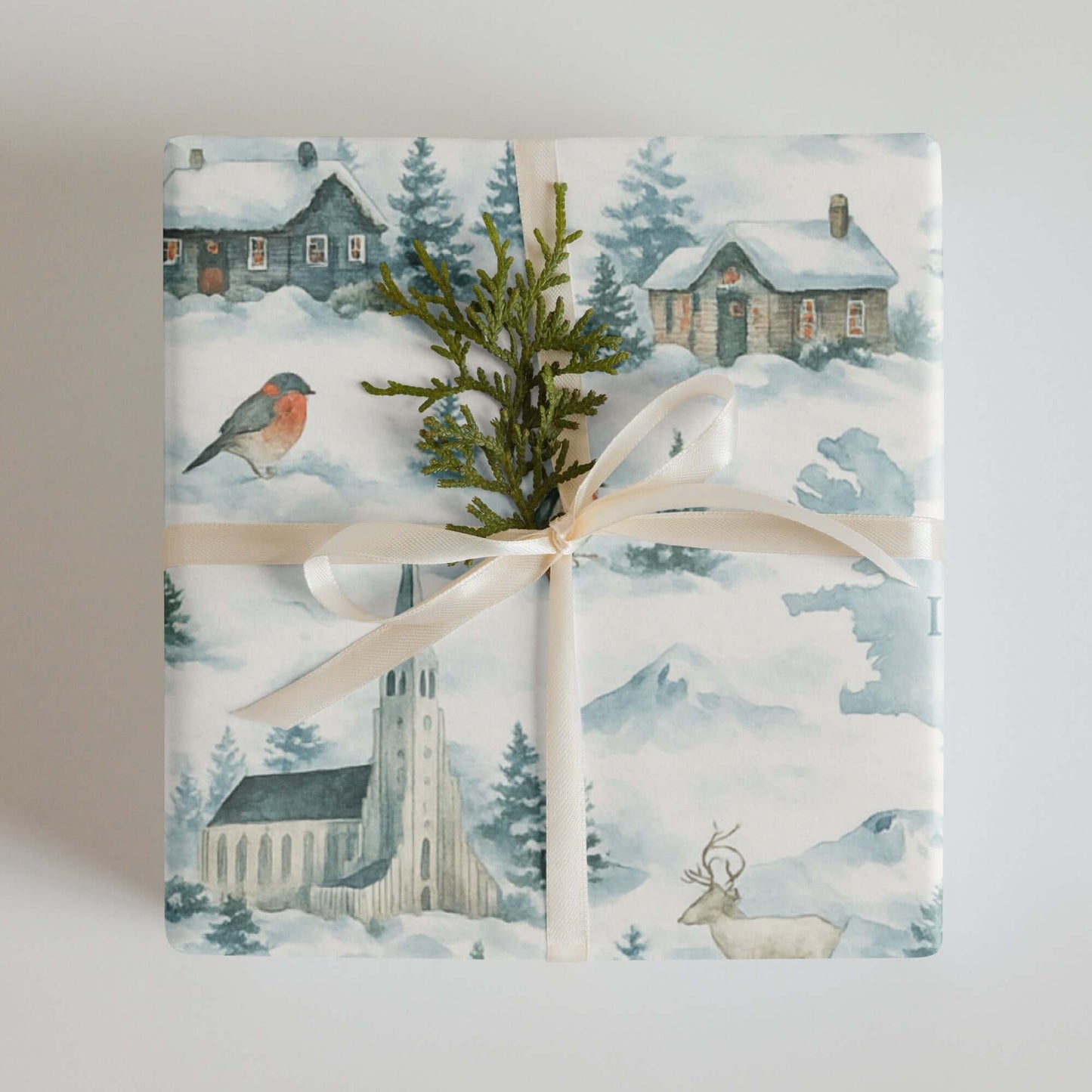 Luxury Christmas wrapping paper in watercolor design, featuring winter village scenes and Hallgrímskirkja church.