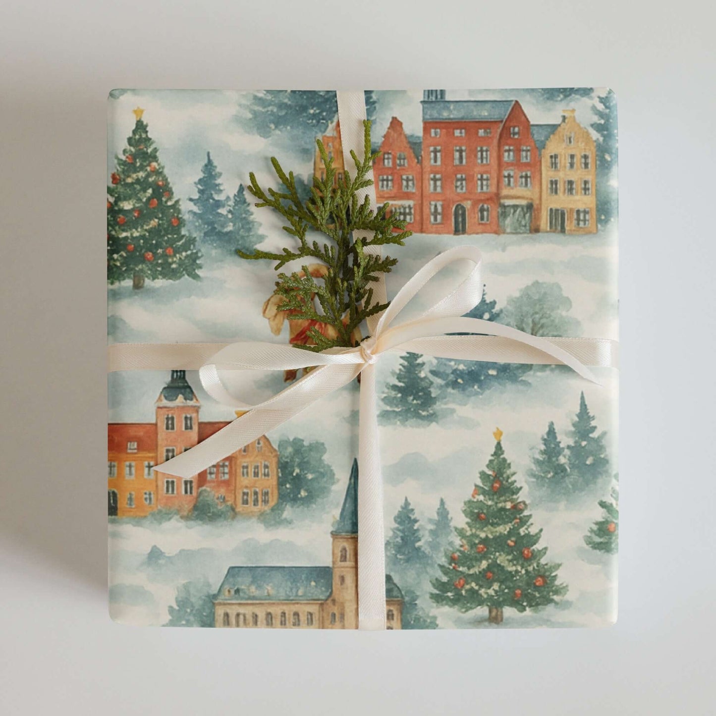 Luxury Christmas wrapping paper featuring watercolor Scandinavian village design with snowy trees and festive decor.