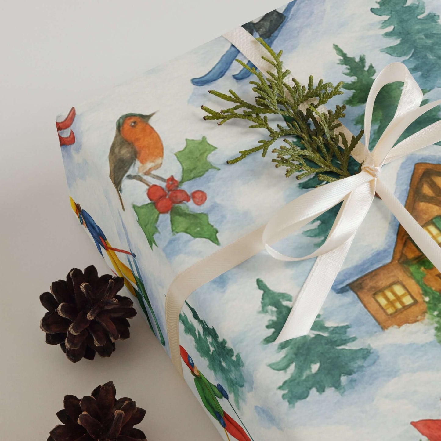 Luxury Christmas wrapping paper featuring watercolor skiers, woodland animals, and festive holiday greenery.