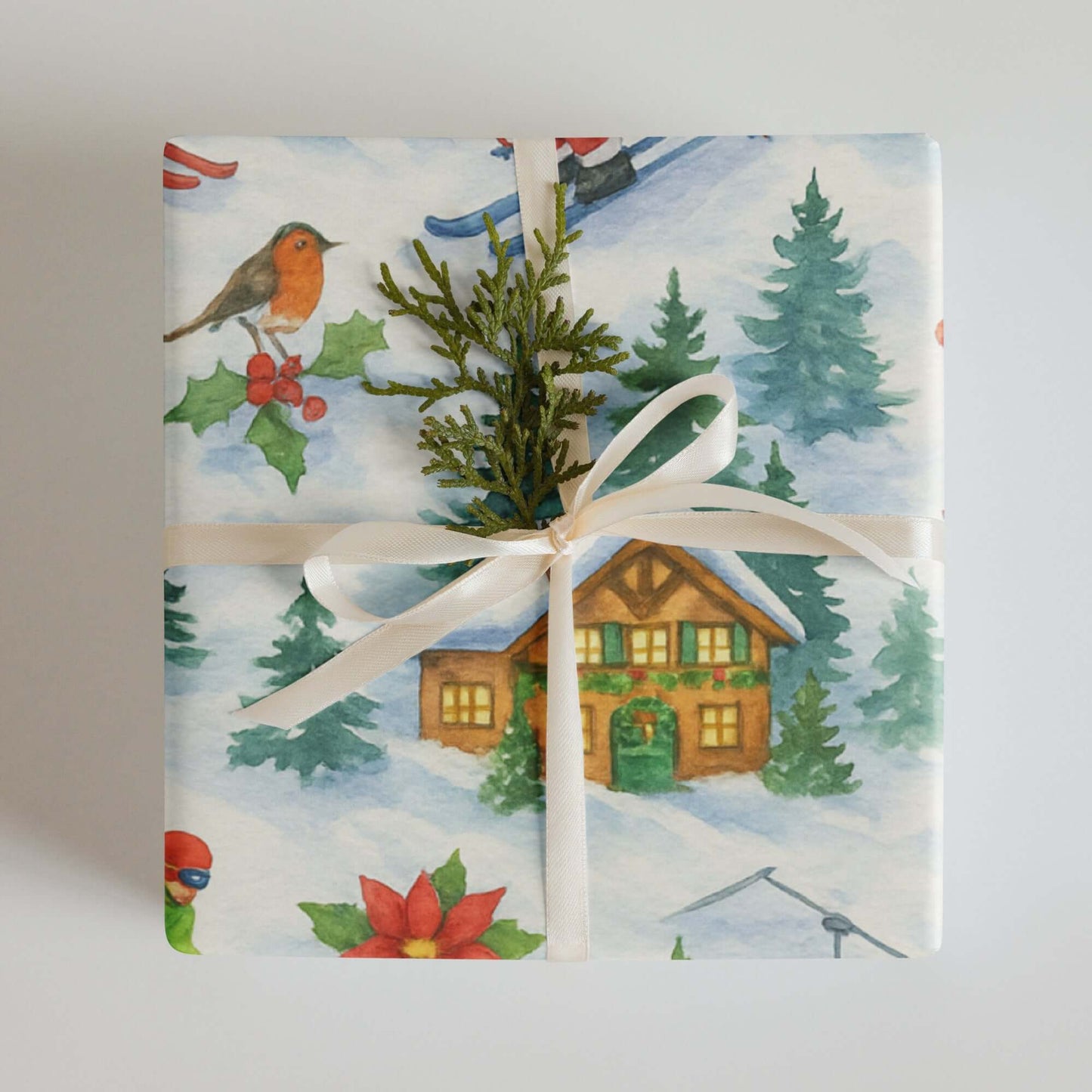 Luxury Christmas wrapping paper featuring watercolor skiers, holiday motifs, and a rustic alpine cabin design.