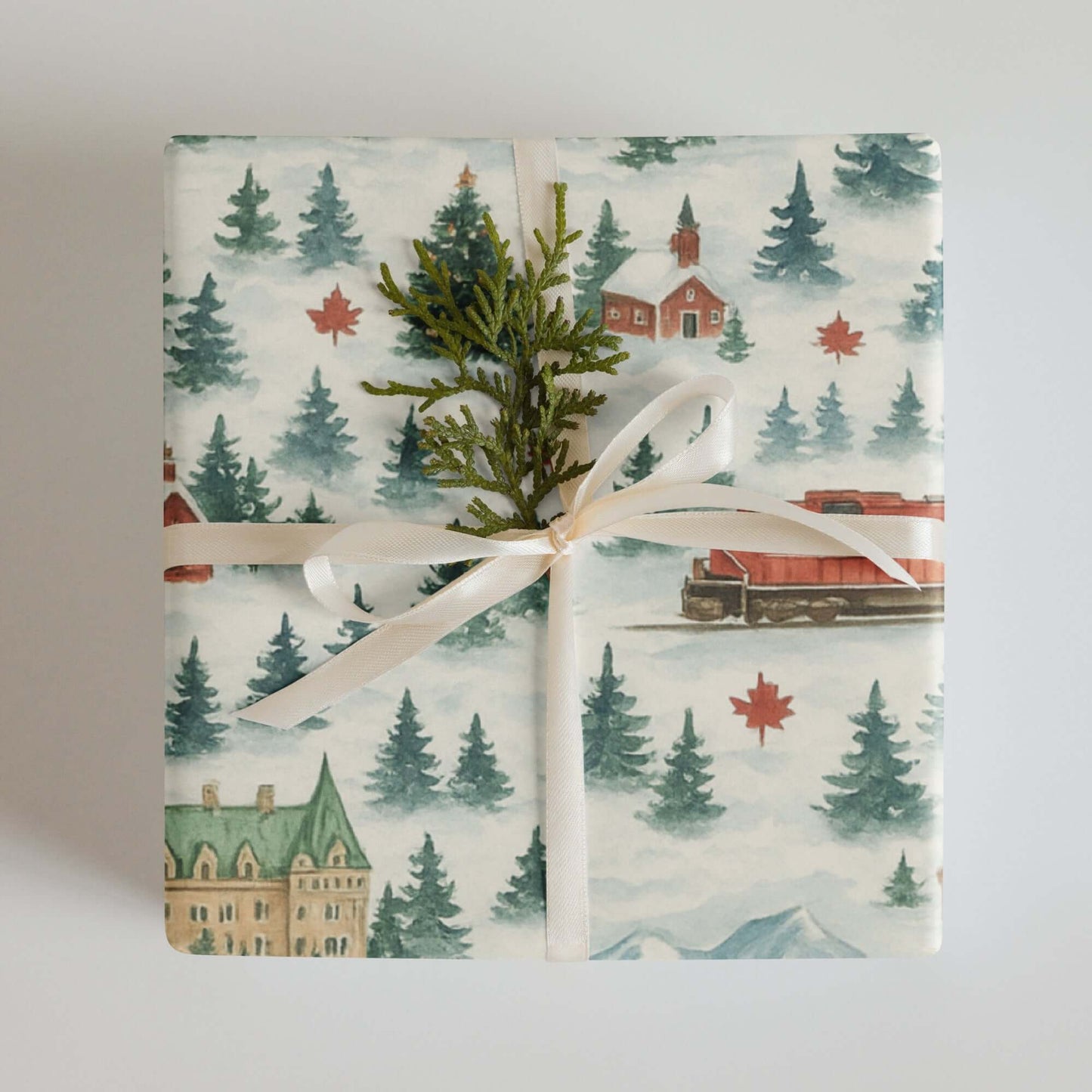 Luxury Christmas wrapping paper featuring a watercolor winter scene with Canadian landmarks.