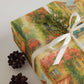 Watercolor European Bistro wrapping paper with floral design and ribbon, ideal for luxury holiday gift wrap.