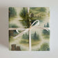 Luxury outdoor-themed wrapping paper featuring watercolor wilderness designs, eco-friendly and made in USA.