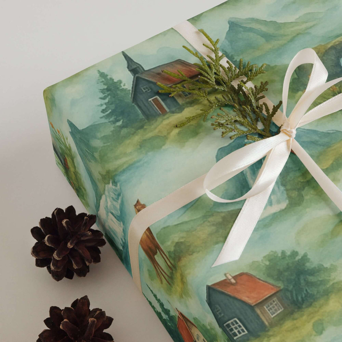 Iceland Wrapping Paper featuring hand-painted landscapes, cottages, and pinecones for unique gift wrapping.