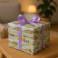 Luxury Christmas wrapping paper featuring lavender fields in watercolor design with rustic barns and purple bow.