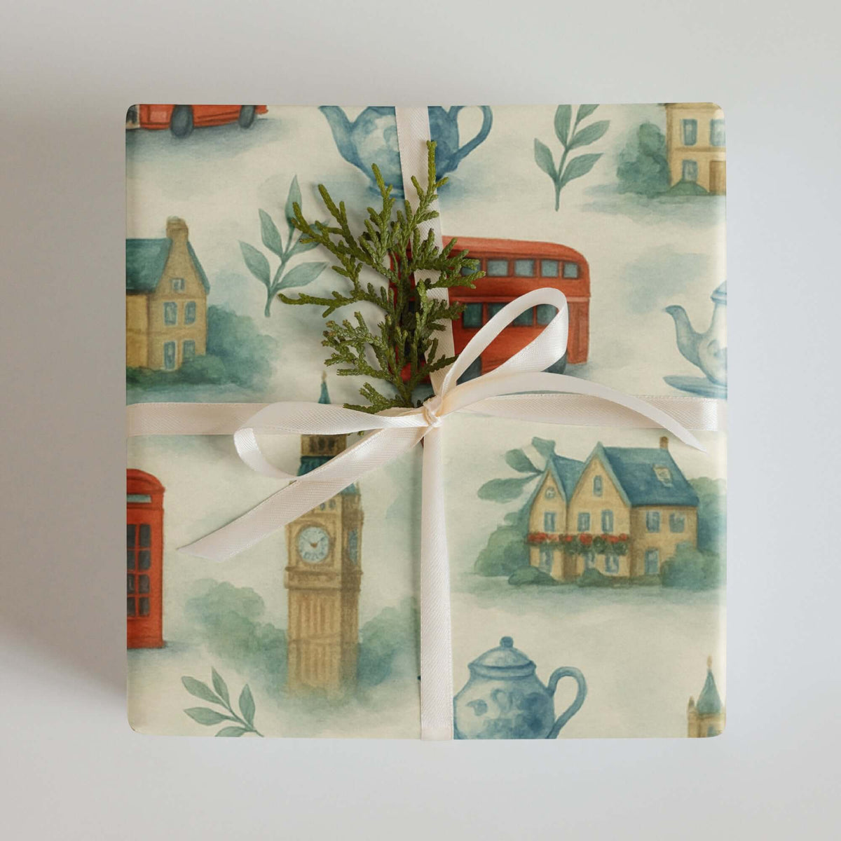 London Tea Wrapping Paper featuring iconic London landmarks and cozy teapots in soft watercolor shades.