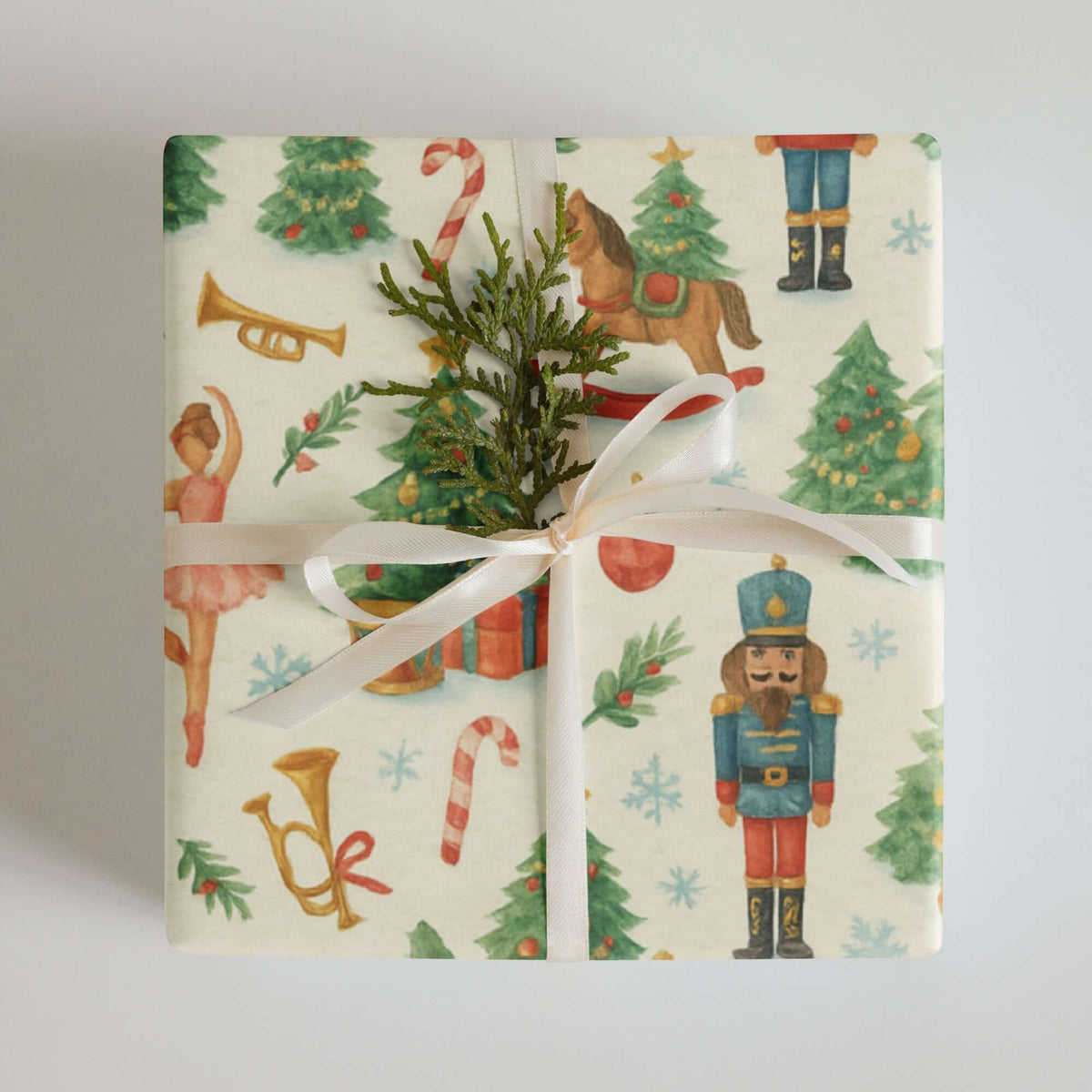 Nutcracker Christmas Wrapping Paper featuring whimsical holiday designs like nutcracker soldiers and Christmas trees.