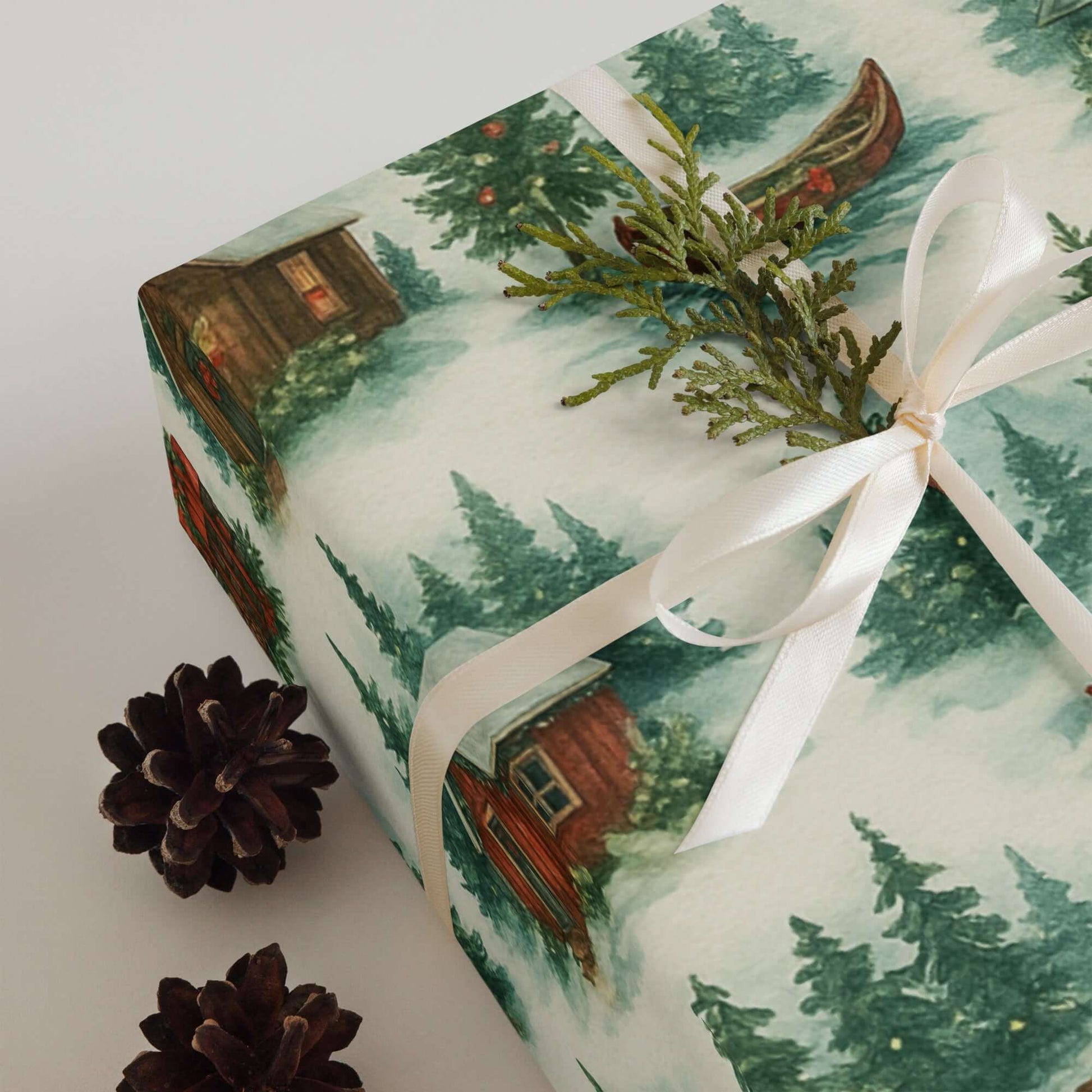 Luxury Christmas wrapping paper with watercolor log cabin and pine tree design, perfect for holiday gift wrap.