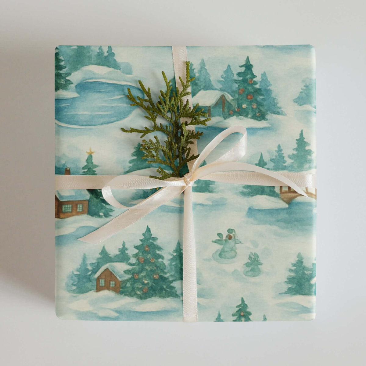 Skating Winter Christmas Wrapping Paper featuring skaters, cabin, evergreens, and snowmen in a watercolor design.