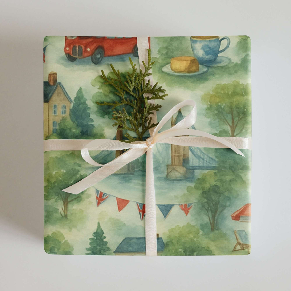 UK British Wrapping Paper featuring London icons and countryside scenes, beautifully wrapped with a ribbon.