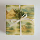 Africa Wrapping Paper featuring pyramids and a scenic landscape, perfect for globally inspired gift wrapping.