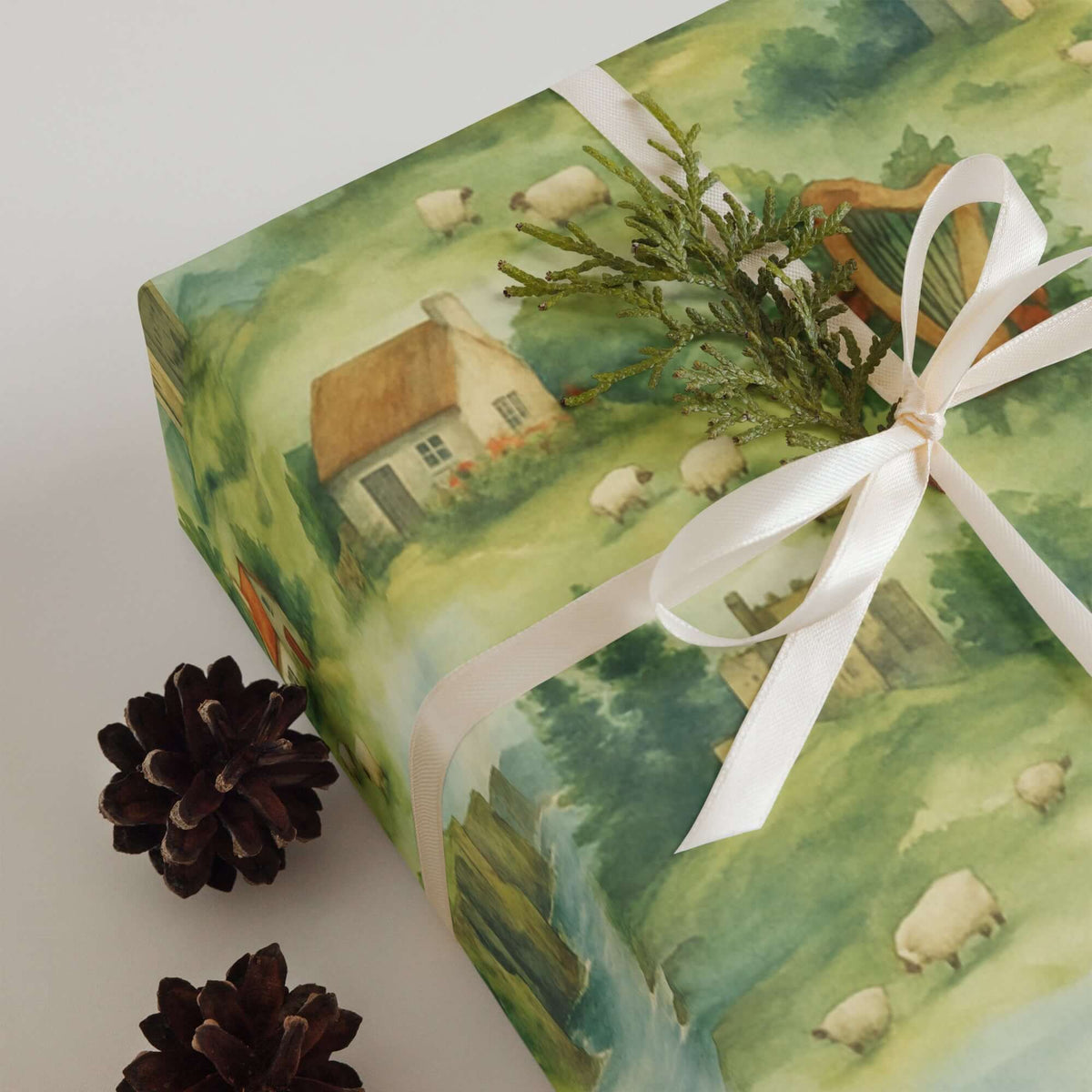 Ireland Wrapping Paper showcasing a pastoral scene with cottages, sheep, and greenery, perfect for gift wrapping.