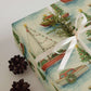 Boats Christmas Wrapping Paper features watercolor sailboats and rowboats on a beautifully wrapped gift.