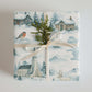 Luxury Christmas wrapping paper in watercolor design, featuring winter village scenes and Hallgrímskirkja church.