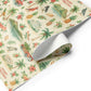 Luxury Hawaii Christmas wrapping paper with watercolor tropical designs, including pineapples, hibiscus, and festive decorations.