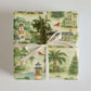 Luxury Christmas wrapping paper featuring watercolor Southern holiday scenes and festive decorations.