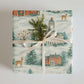Luxury Midwest USA Christmas wrapping paper featuring watercolor design of snowy landscapes and rustic buildings.