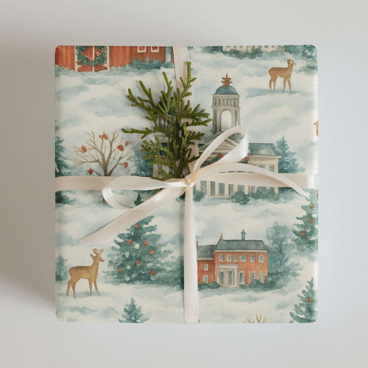 Luxury Midwest USA Christmas wrapping paper featuring watercolor design of snowy landscapes and rustic buildings.