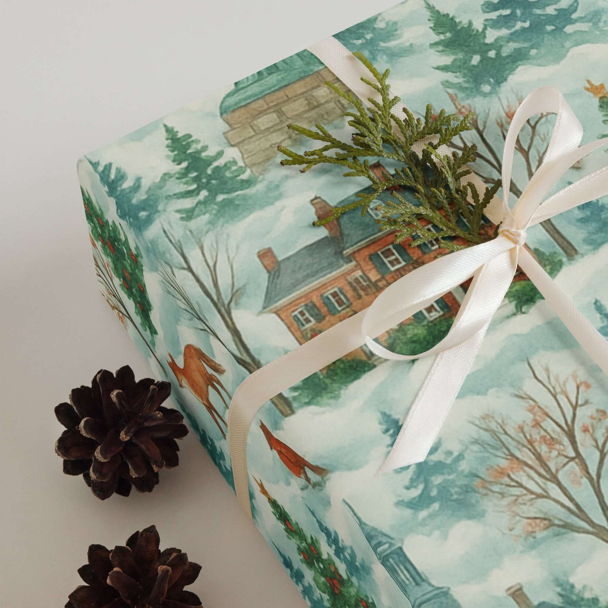 Luxury New England-themed Christmas wrapping paper in watercolor style with pine accents.