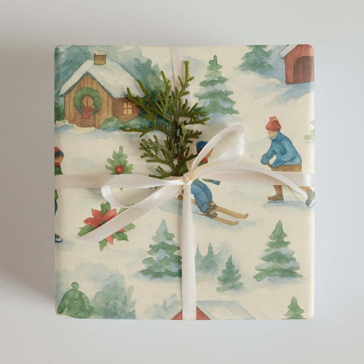 Luxury Christmas wrapping paper featuring watercolor winter sports scenes, eco-friendly, made in USA.