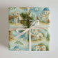 Greece Wrapping Paper featuring Greek houses, blue domes, and sailboats on a beautiful Mediterranean landscape.